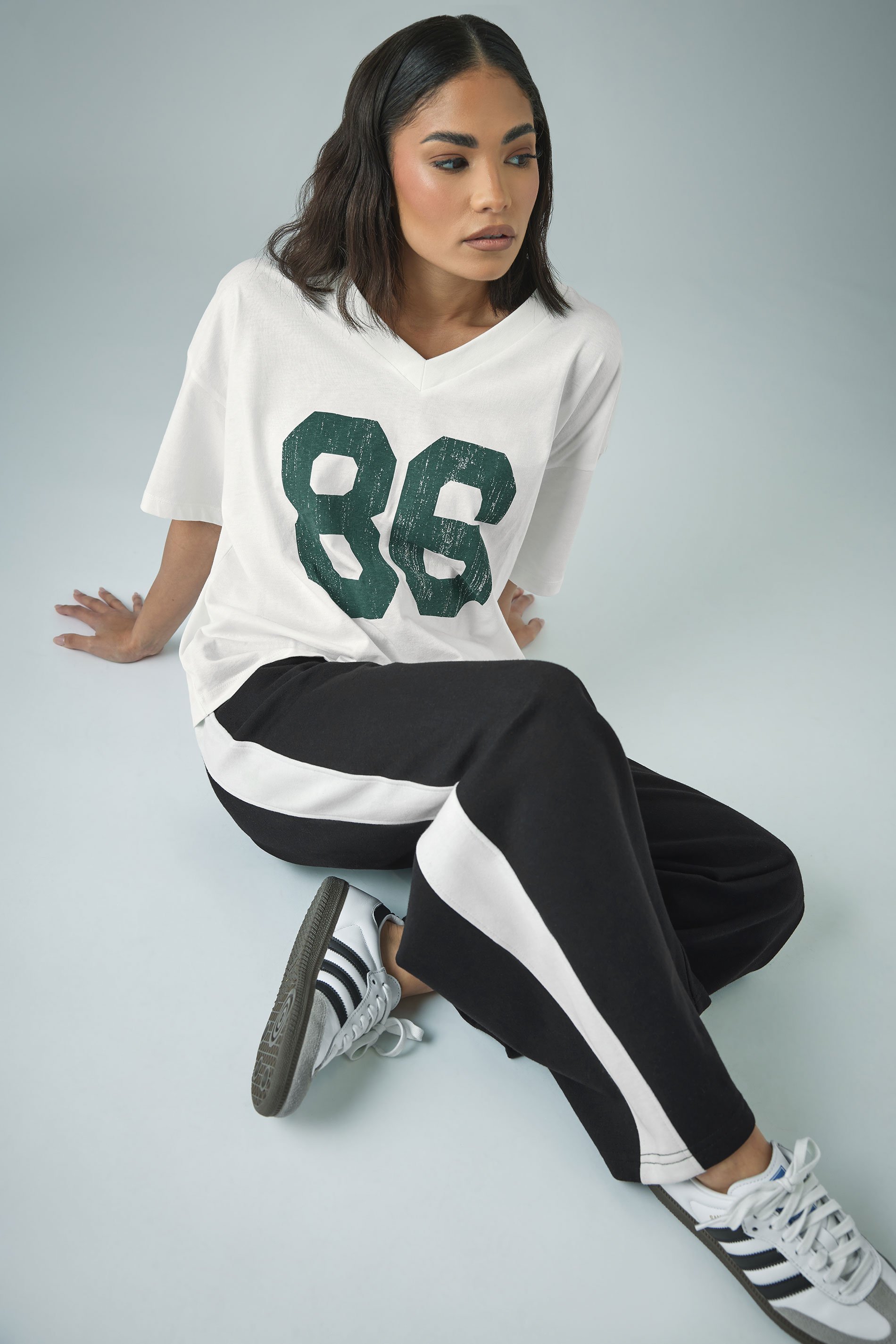 PixieGirl Petite Women's Black Side Striped Wide Leg Jogger | PixieGirl 1