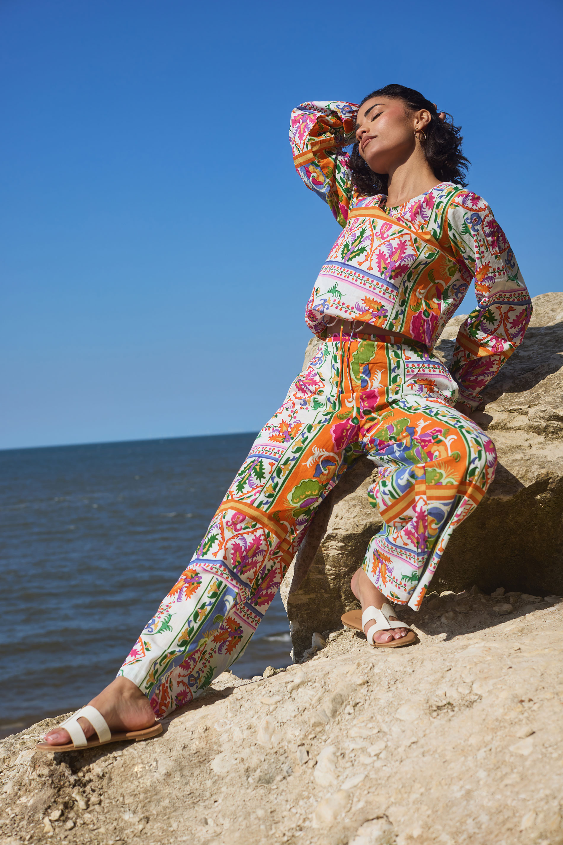 PixieGirl Petite Women's Orange Abstract Tile Print Wide Leg Trousers | PixieGirl 1