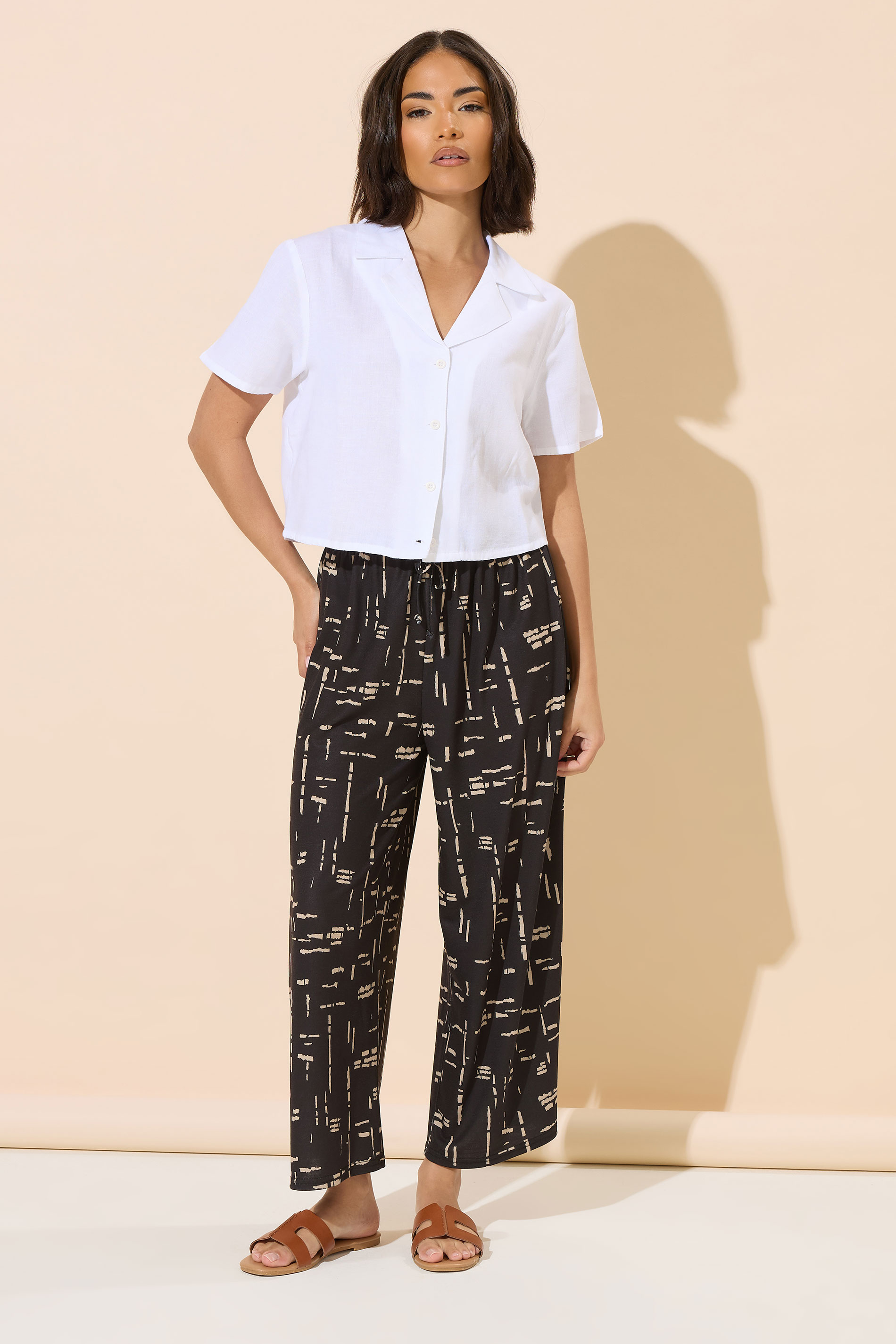 PixieGirl Petite Women's Black Abstract Print Cropped Trousers | PixieGirl 1