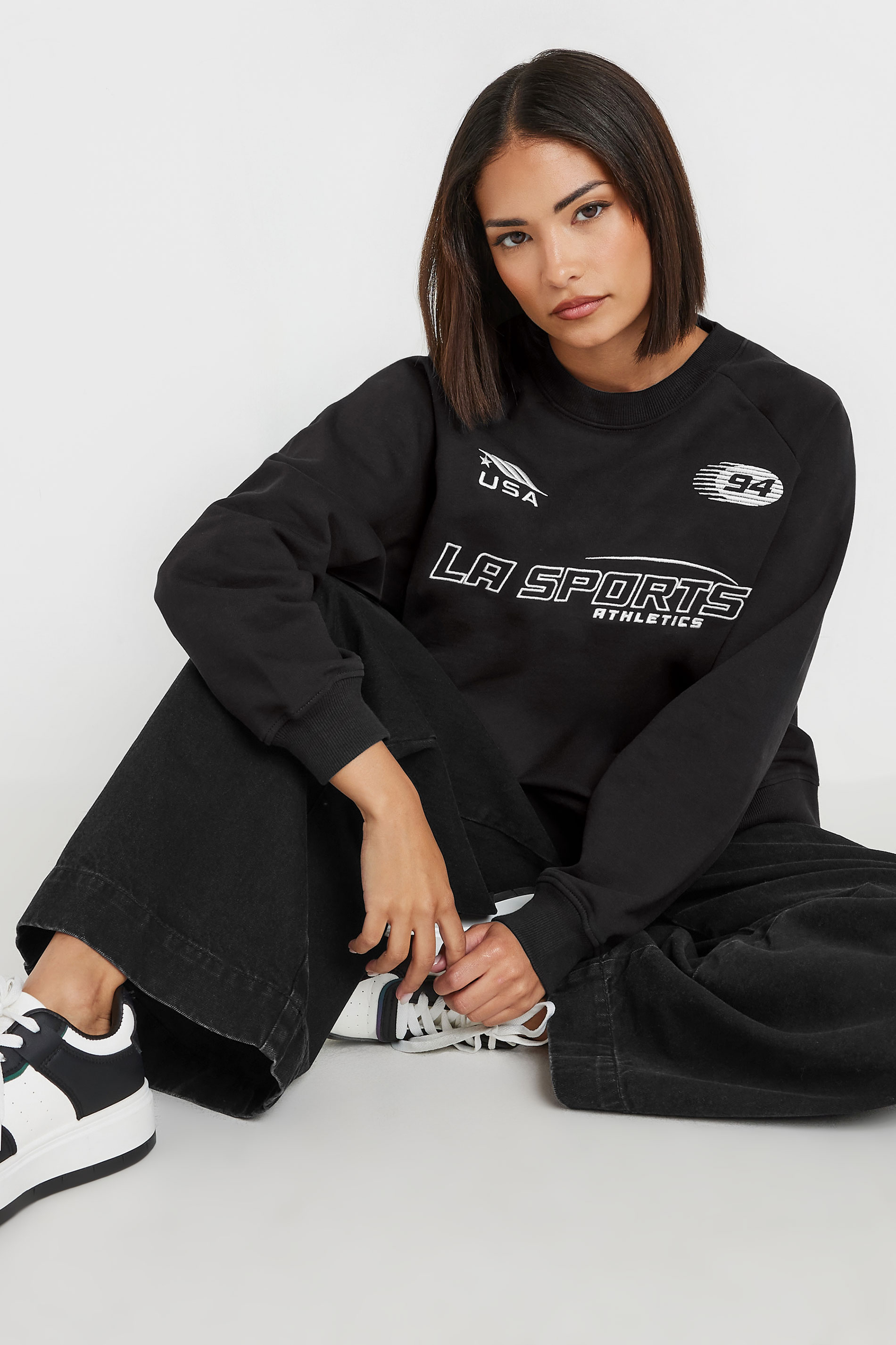 PixieGirl Petite Women's Black 'La Sports' Slogan Sweatshirt | PixieGirl 1