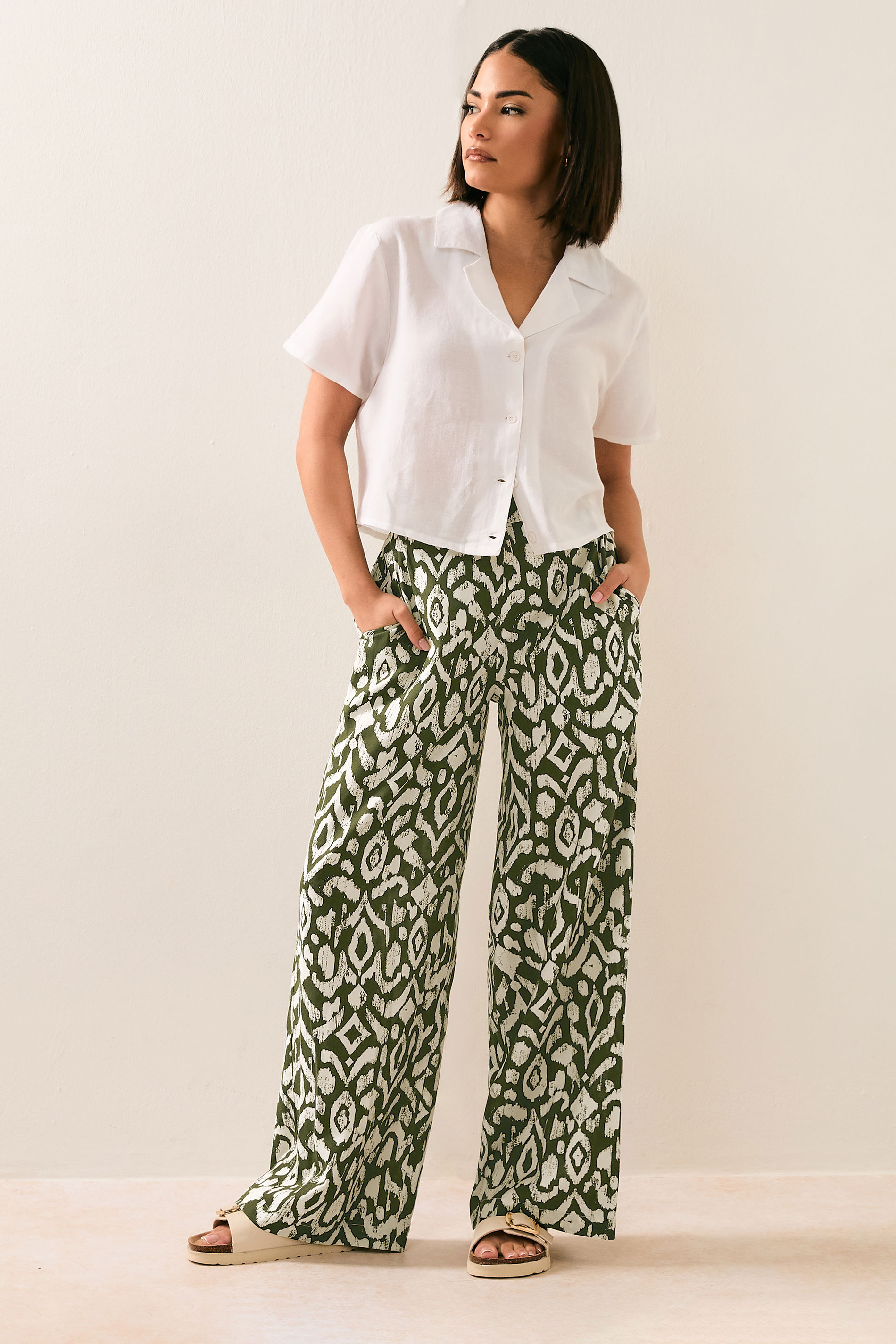 PixieGirl Petite Women's Khaki Green Abstract Print Wide Leg Trousers | PixieGirl 1