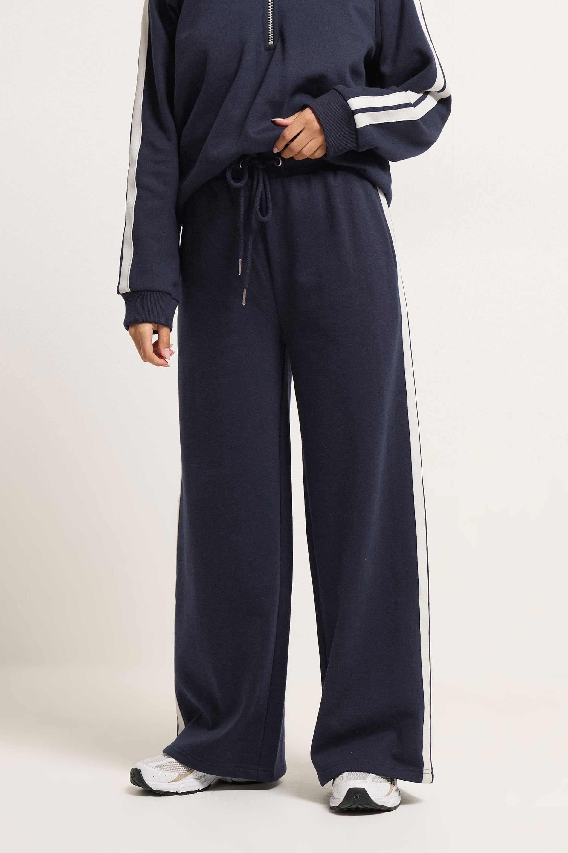 PixieGirl Petite Women's Navy Blue Stripe Wide Leg Joggers | PixieGirl 1