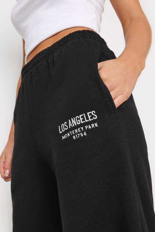 PixieGirl Petite Womens Black 'Los Angeles' Slogan Wide Leg Joggers | PixieGirl  4