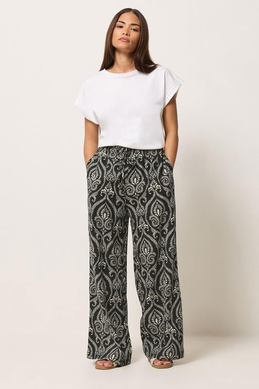 PixieGirl Petite Women's Black Tile Wide Leg Trousers | PixieGirl 1