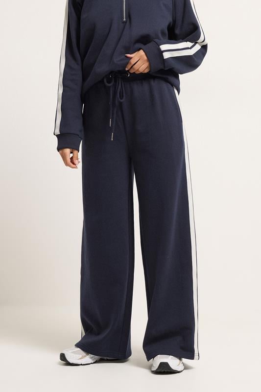 PixieGirl Petite Women's Navy Blue Stripe Wide Leg Joggers | PixieGirl 1