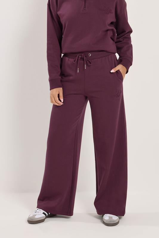 PixieGirl Petite Women's Burgundy Red 'Monte Carlo' Slogan Wide Leg Joggers | PixieGirl 2