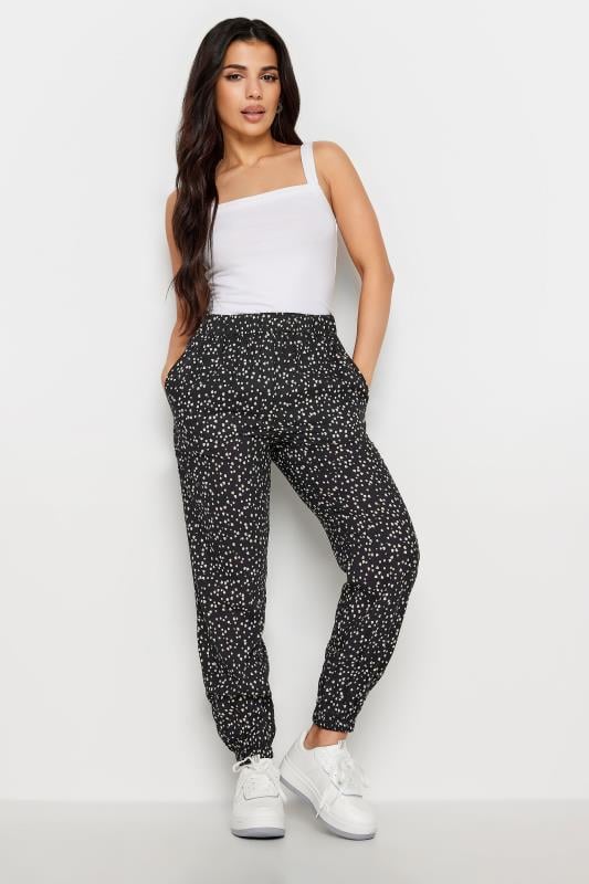 Buy Black/White Dogtooth Ponte Slim Leg Trousers from Next Germany