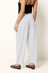 PixieGirl Petite Women's White Polka Dot Crinkle Barrel Leg Trousers | PixieGirl 6