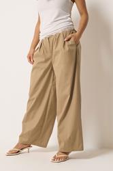 PixieGirl Petite Women's Stone Brown Pleated Cotton Barrel Trousers | PixieGirl  1