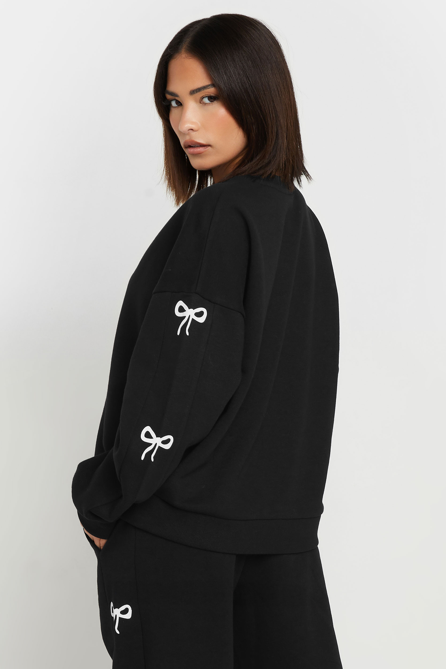 PixieGirl Petite Women's Black Bow Detail Sweatshirt | PixieGirl 3