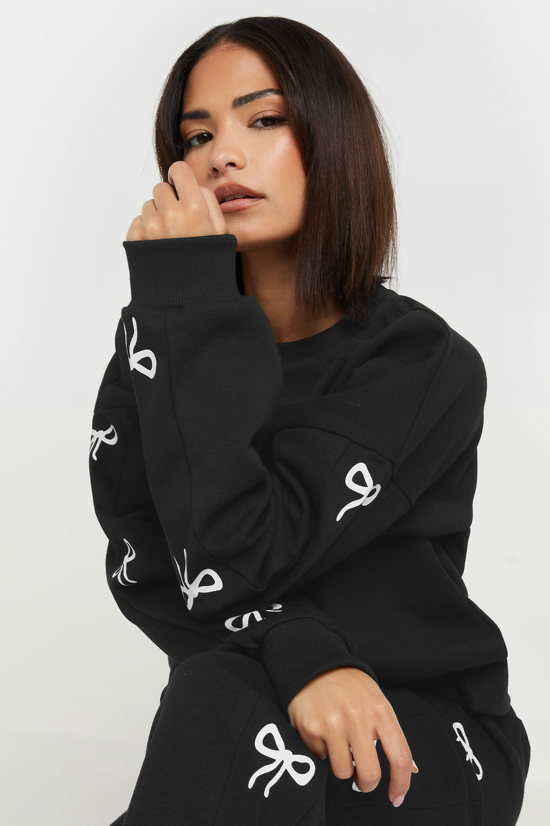 PixieGirl Petite Women's Black Bow Detail Sweatshirt | PixieGirl 2