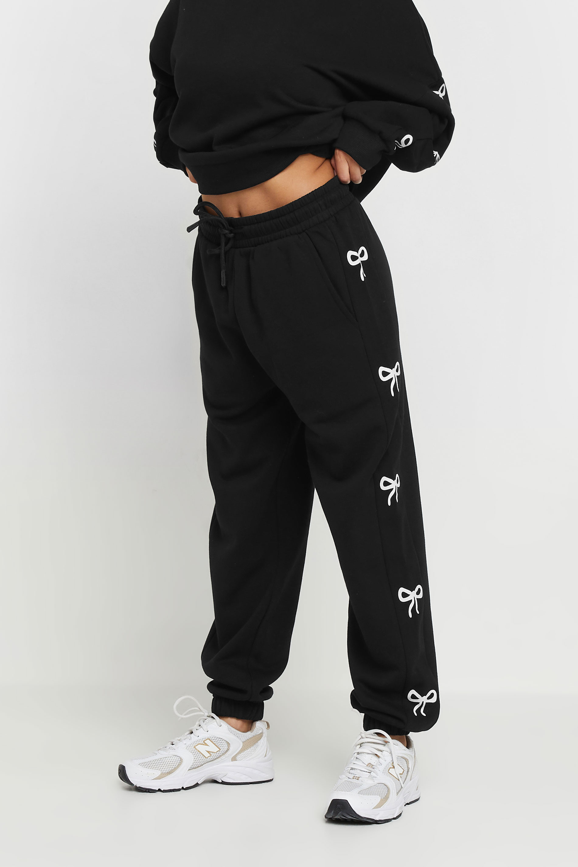 PixieGirl Petite Women's Black Bow Detail Cuffed Joggers | PixieGirl 2